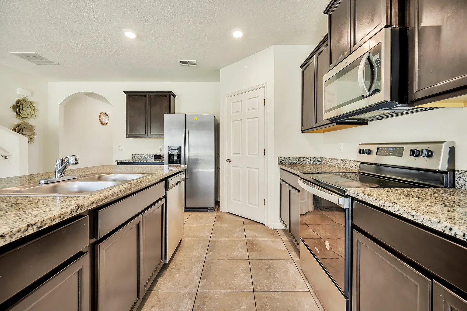 newer kitchen with stainless appliances